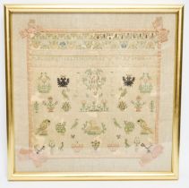 A framed needlework sampler dated 1801, 34 x 33cm