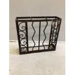 A French wrought iron three division stick stand, width 55cm, depth 15cm, height 50cm