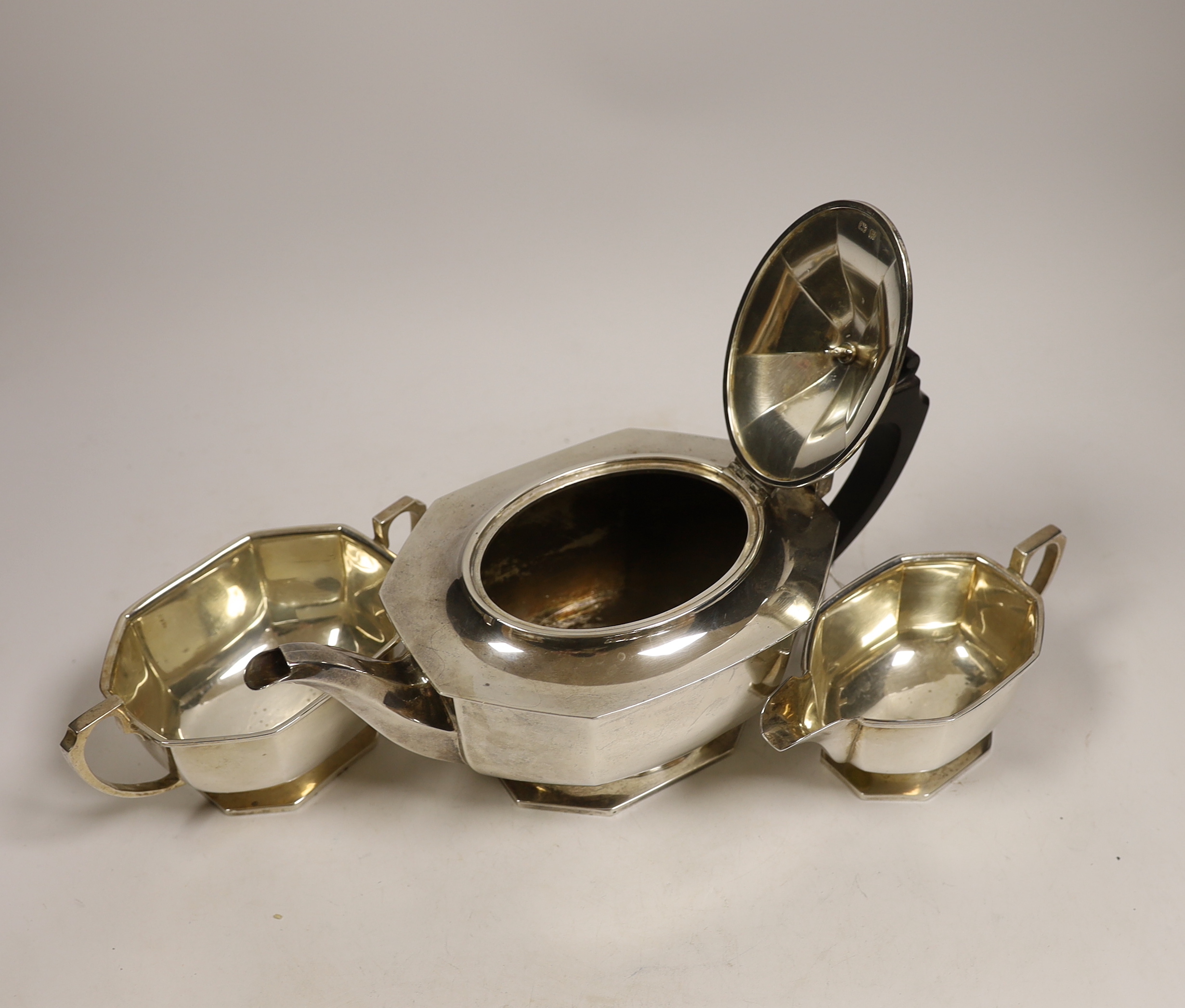 A George V silver three piece tea set, Docker & Burn Ltd, Birmingham, 1929, gross weight 32.1oz. - Image 2 of 3