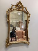 A reproduction giltwood and composition marginal plate wall mirror, width 56cm, height 96cm