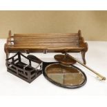 An oak book trough, a rosewood rack, a hand mirror and a telescopic hand mirror