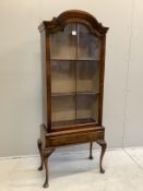 A Queen Anne Revival walnut display cabinet, width 74cm, depth 36cm, height 177cm