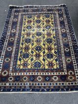 A North West Persian gold ground rug, 150 x 112cm