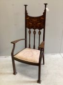 An Art Nouveau inlaid mahogany elbow chair in the manner of Shapland and Petter, width 65cm, depth