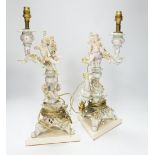 A pair of Sitzendorf floral encrusted porcelain table lamps, 42cm total