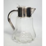 A silver plated mounted lemonade jug, 27cm high