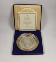A cased limited edition silver plate commemorating the Silver Wedding of Queen Elizabeth II and H.R.