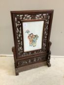 A Chinese Republic carved hardwood table screen, inset porcelain panel, width 53cm, height 79cm