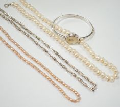 A modern 925 chain, a lady's 925 bangle watch and two cultured pearl necklaces.