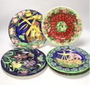 Set of nine Maling, Newcastle pottery plates, many with tube lined decoration including a galleon