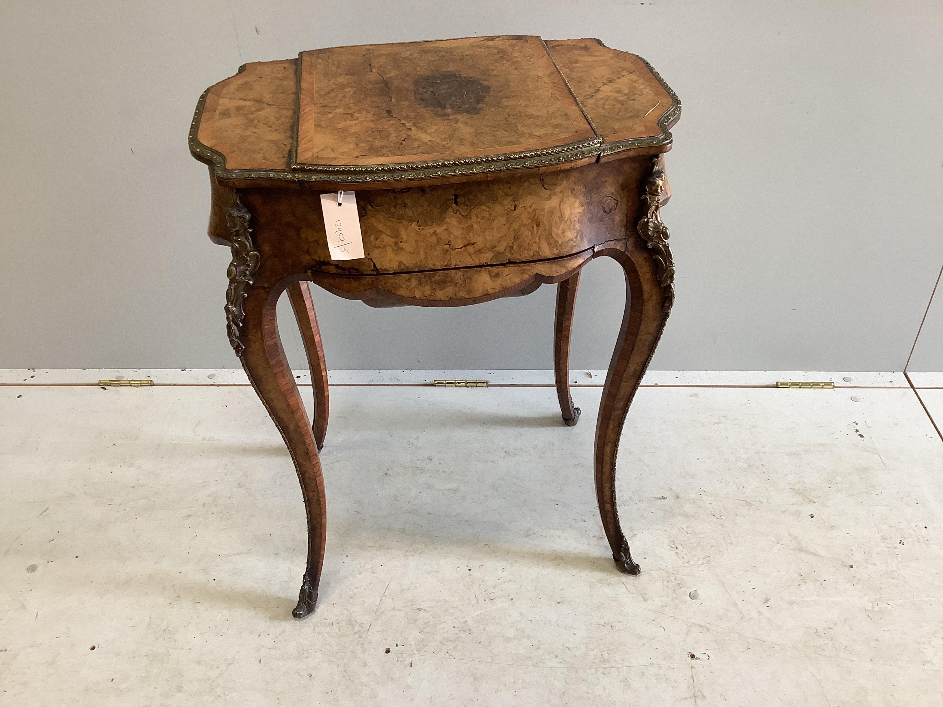 A Victorian gilt metal mounted tulip banded burr walnut enclosed dressing table/work box, width