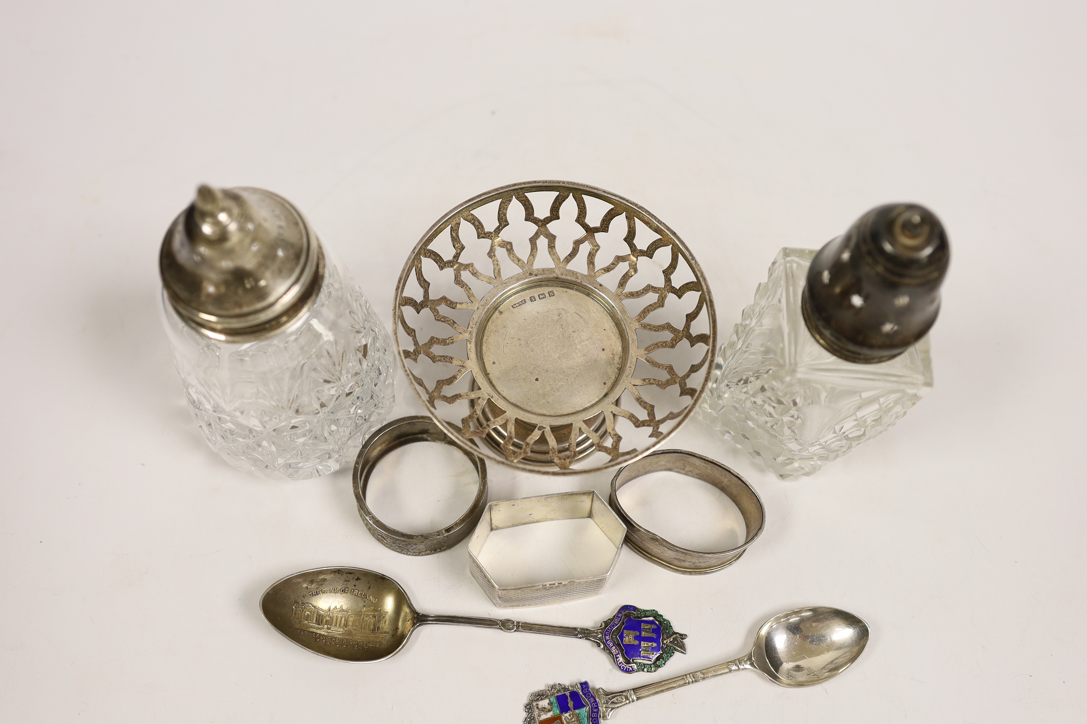 A group of small silver including two mounted glass sugar sifters, three assorted napkin rings, - Image 4 of 4