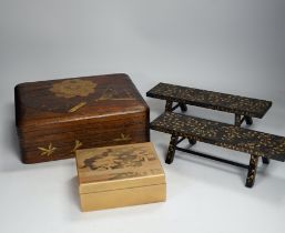 A group of Japanese lacquer wares, comprising pair of miniature benches and two boxes, Meiji