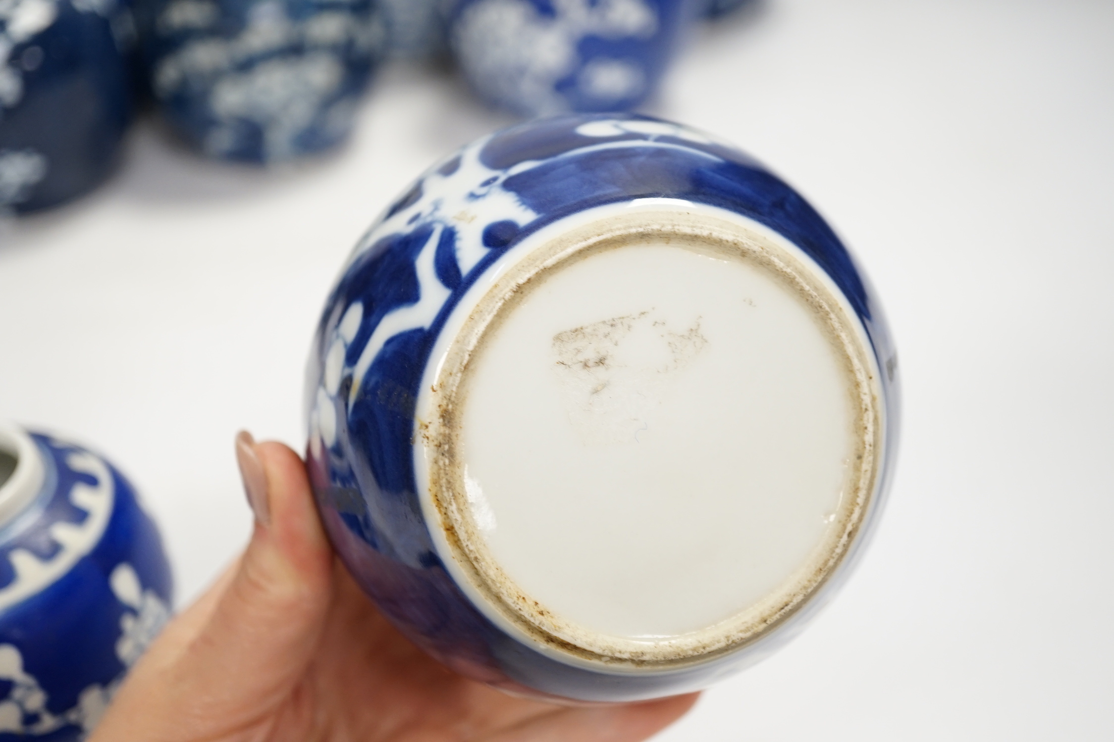 A Chinese blue and white 'shuangxi' jar, and seven blue and white 'prunus' jars and one cover, - Image 4 of 5