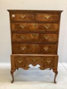 An 18th century walnut chest on stand, width 97cm, depth 56cm, height 146cm