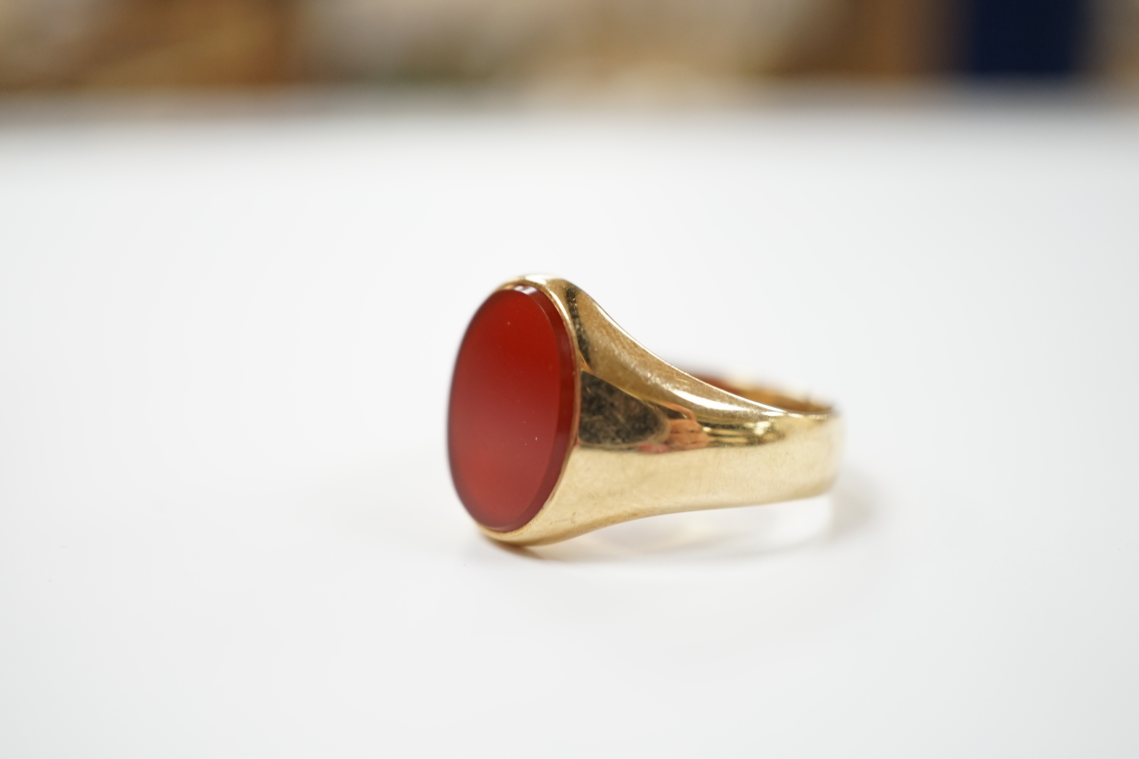 A 9ct gold and single stone oval carnelian set signet ring, size W, gross weight 8.7 grams. - Image 2 of 3