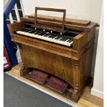 A Victorian walnut harmonium, width 106cm, depth 49cm, height 88cm