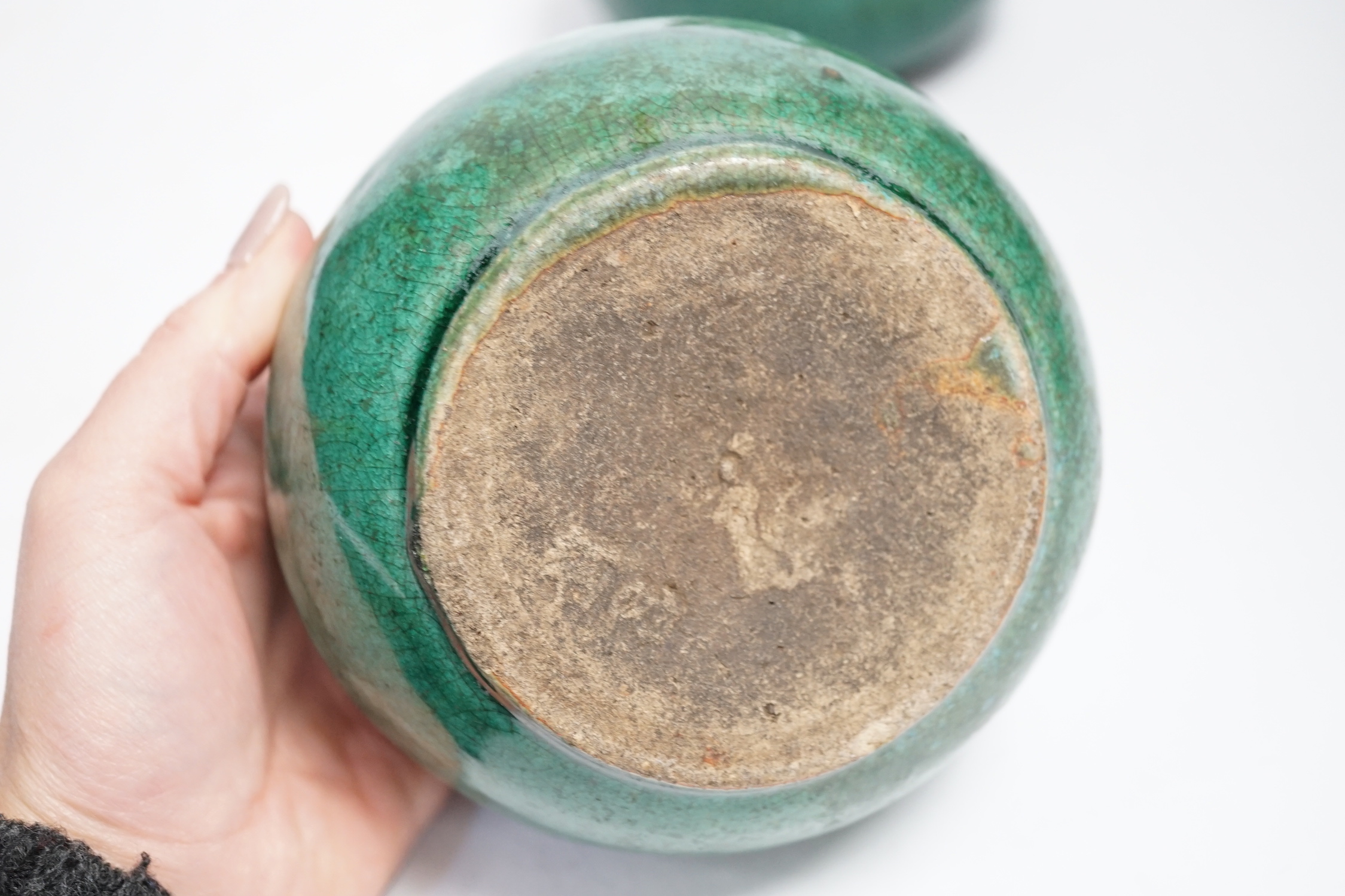 A pair of Chinese pottery monochrome green glazed jars, 10cm high - Image 4 of 4