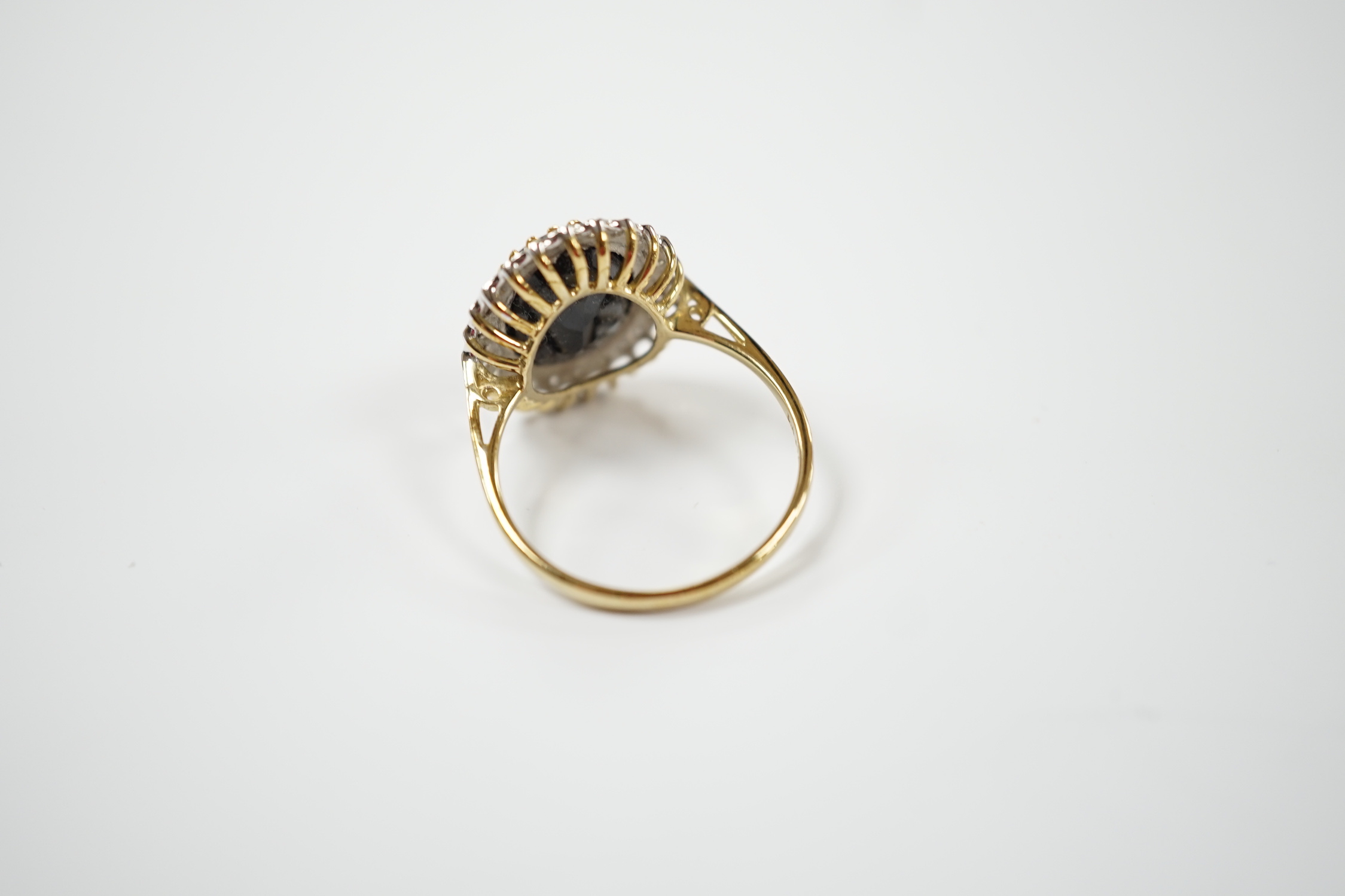 A modern 9ct gold sapphire and diamond set oval cluster ring, size U/V, gross weight 4.9 grams. - Bild 3 aus 3
