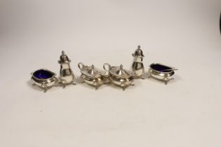 A George V silver three piece condiment set, Adie Brothers, Birmingham, 1928 and two matching