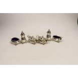 A George V silver three piece condiment set, Adie Brothers, Birmingham, 1928 and two matching