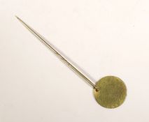 Yellow metal disc - a relic of the foundation piles to the Old London Bridge, 6.5cm in length
