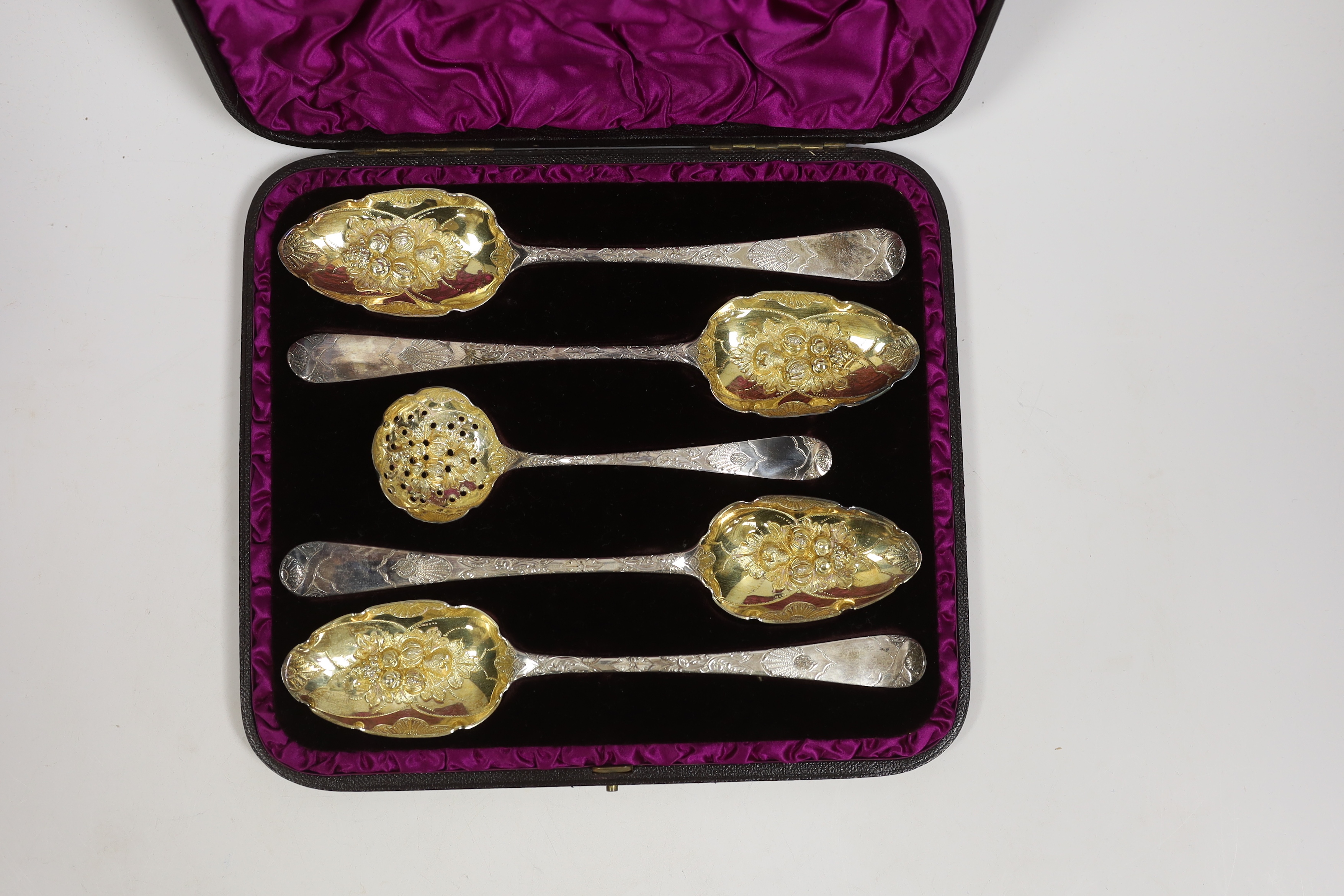 A cased George III matched silver five piece serving and sifter berry spoon set, two spoons by Eley, - Image 2 of 4