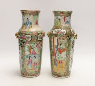 A pair of Chinese Canton famille rose vases, late Qing dynasty, 26cm
