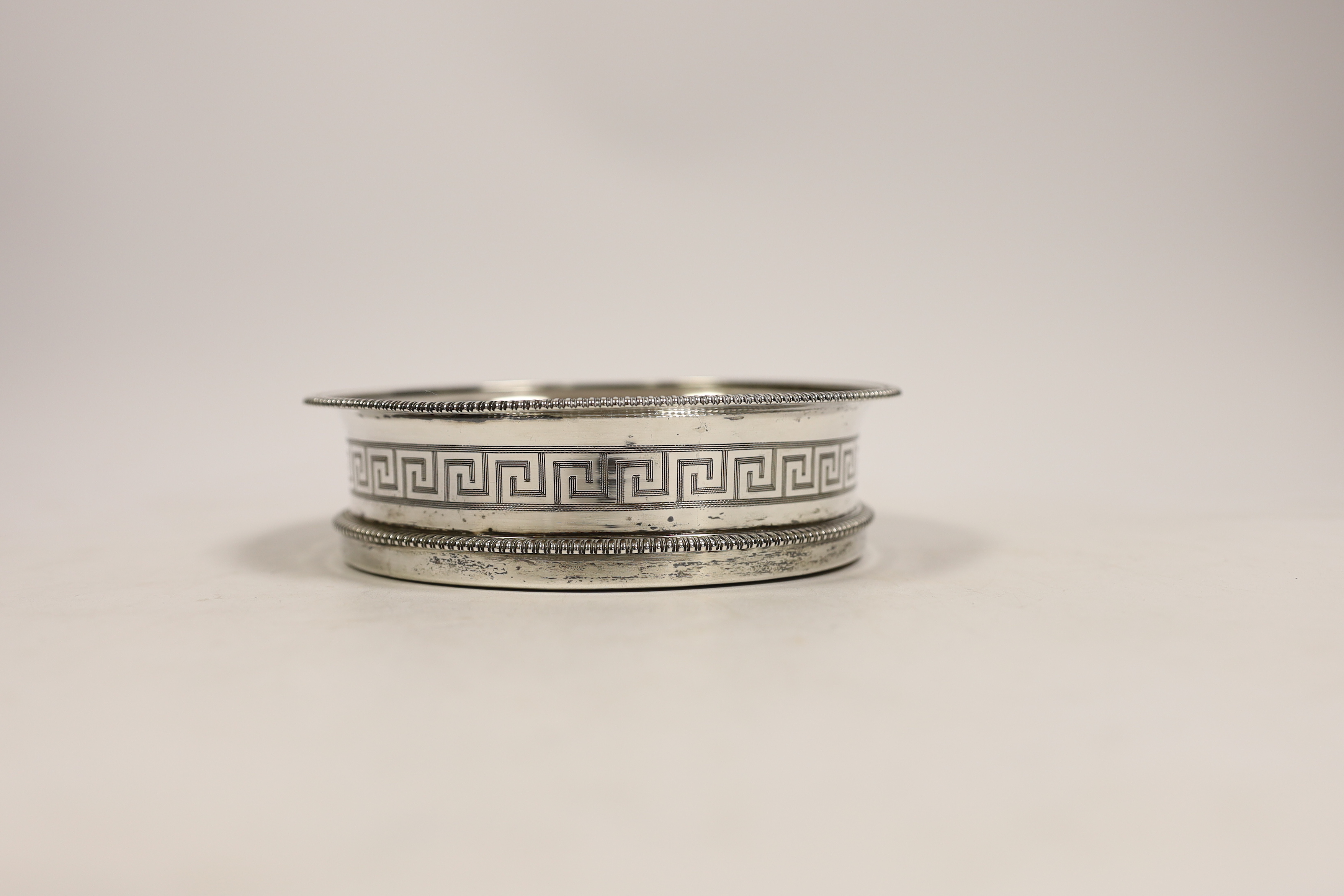 A George III silver mounted wine coaster, with gadrooned border and engraved Greek Key decoration, - Image 2 of 3