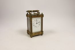 A brass carriage timepiece with square fluted columns, 13cm