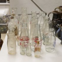 A quantity of vintage glass milk bottles, etc. (23)