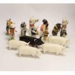 Five Beswick pigs and ten Beswick pig musician band figures
