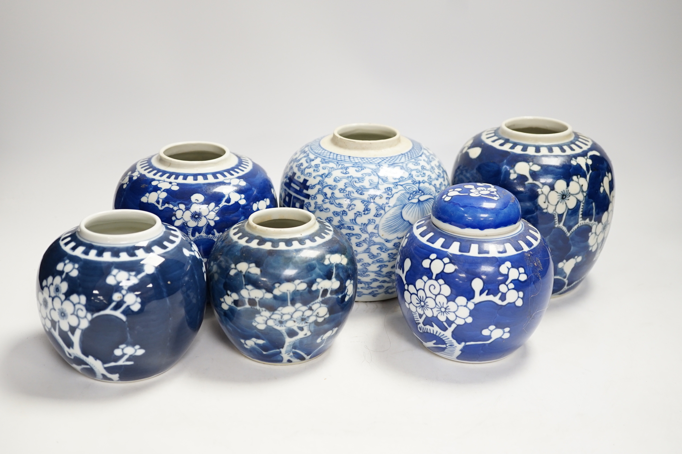 A Chinese blue and white 'shuangxi' jar, and seven blue and white 'prunus' jars and one cover, - Image 3 of 5