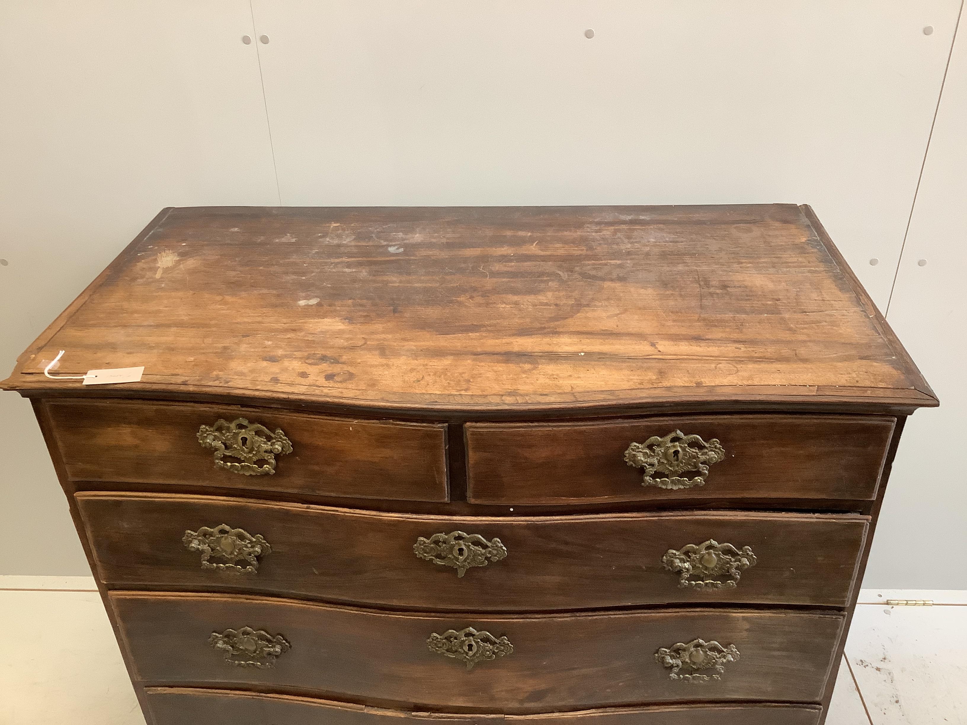 An 18th century Continental rosewood serpentine four drawer chest (missing back foot), width - Image 2 of 3