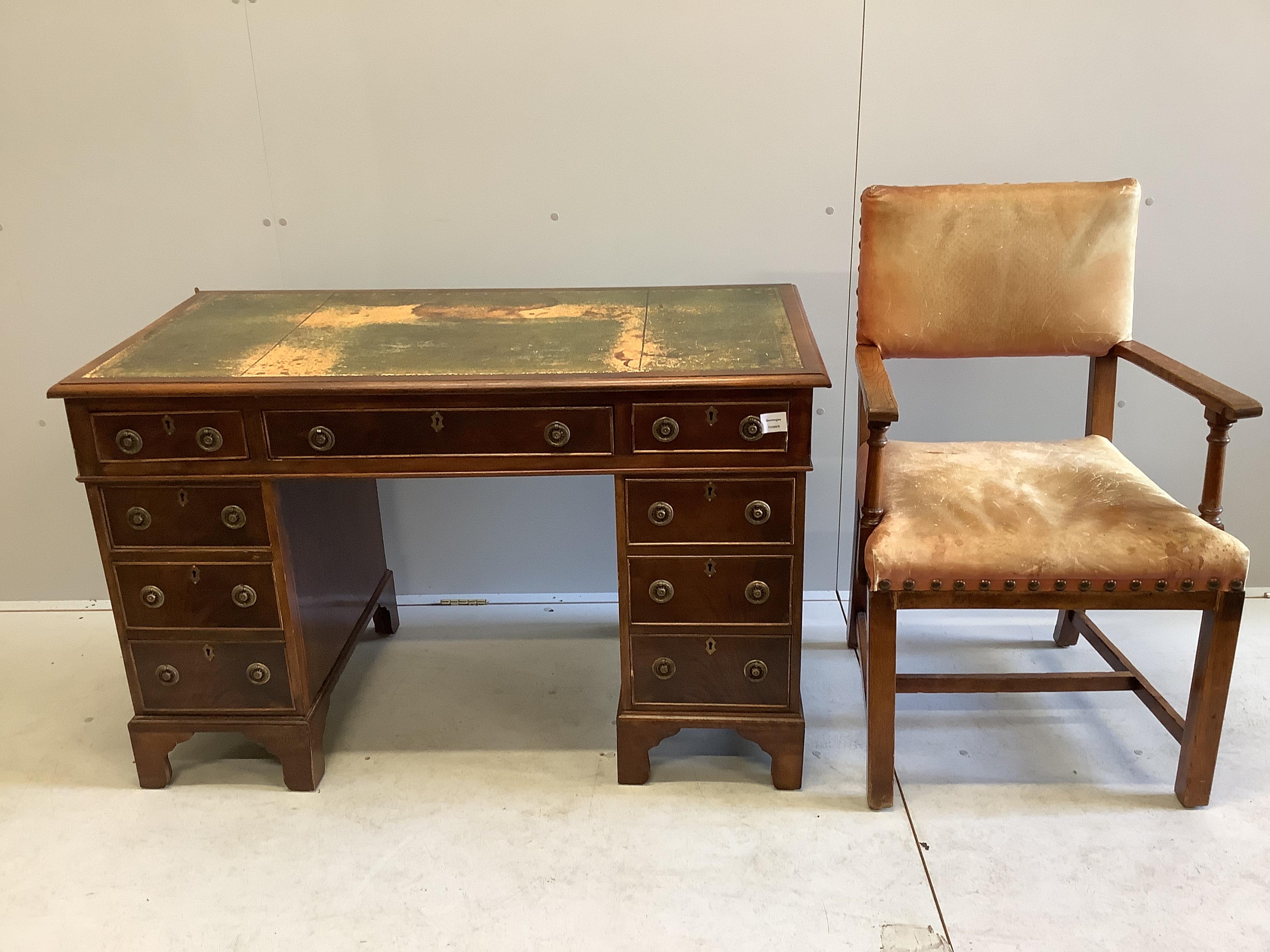 A late Victorian mahogany pedestal desk, width 121cm, depth 61cm, height 77cm together with a