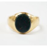 An 18ct gold and single stone oval bloodstone set signet ring, size Z+++++, gross weight 9.7 grams.