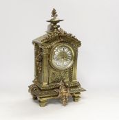 A 20th century French brass and bronze mantel clock, adapted to electric, 34cm