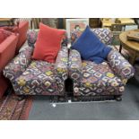 A pair of early 20th century club armchairs, Kilim style upholstered, width 90cm, depth 98cm, height