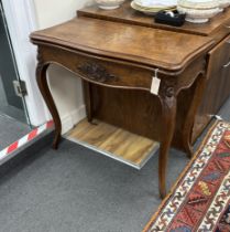 A Victorian walnut serpentine folding card table, width 80cm, depth 40cm, height 73cm.