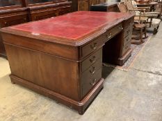 An early 20th century mahogany pedestal partner's desk, width 180cm, depth 116cm, height 78cm