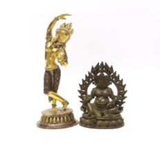 A Tibetan gilt bronze figure of Maya, Queen of Shakya, 20.5cm high, and a Tibetan figure of Jambhala