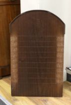 A mahogany Shove Ha’penny board