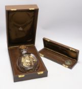 A Churchill silver letter opener and a commemorative Churchill decanter, Garrard & Co, boxed, letter