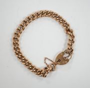An Edwardian 9ct gold curb link bracelet, with heart shaped padlock clasp, 18cm, 13 grams.