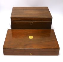 Two mahogany boxes of gun tools, including; bullet moulds, files, a vice, musket balls, etc.