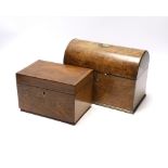 A Victorian burr walnut brass inlaid domed topped tea caddy with domed top interior and a brass