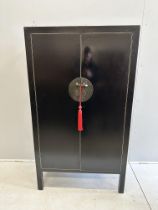 A Chinese black lacquer two door wardrobe, width 93cm, depth 45cm, height 173cm