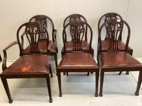 A set of six Hepplewhite style mahogany dining chairs, two with arms