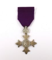 A cased George V Civil MBE, awarded in 1918 to M.F.W. Bunney (1873-1927) for architectural