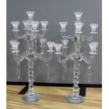 A pair of modern eight branch, nine light lustre candelabra, 63cm high